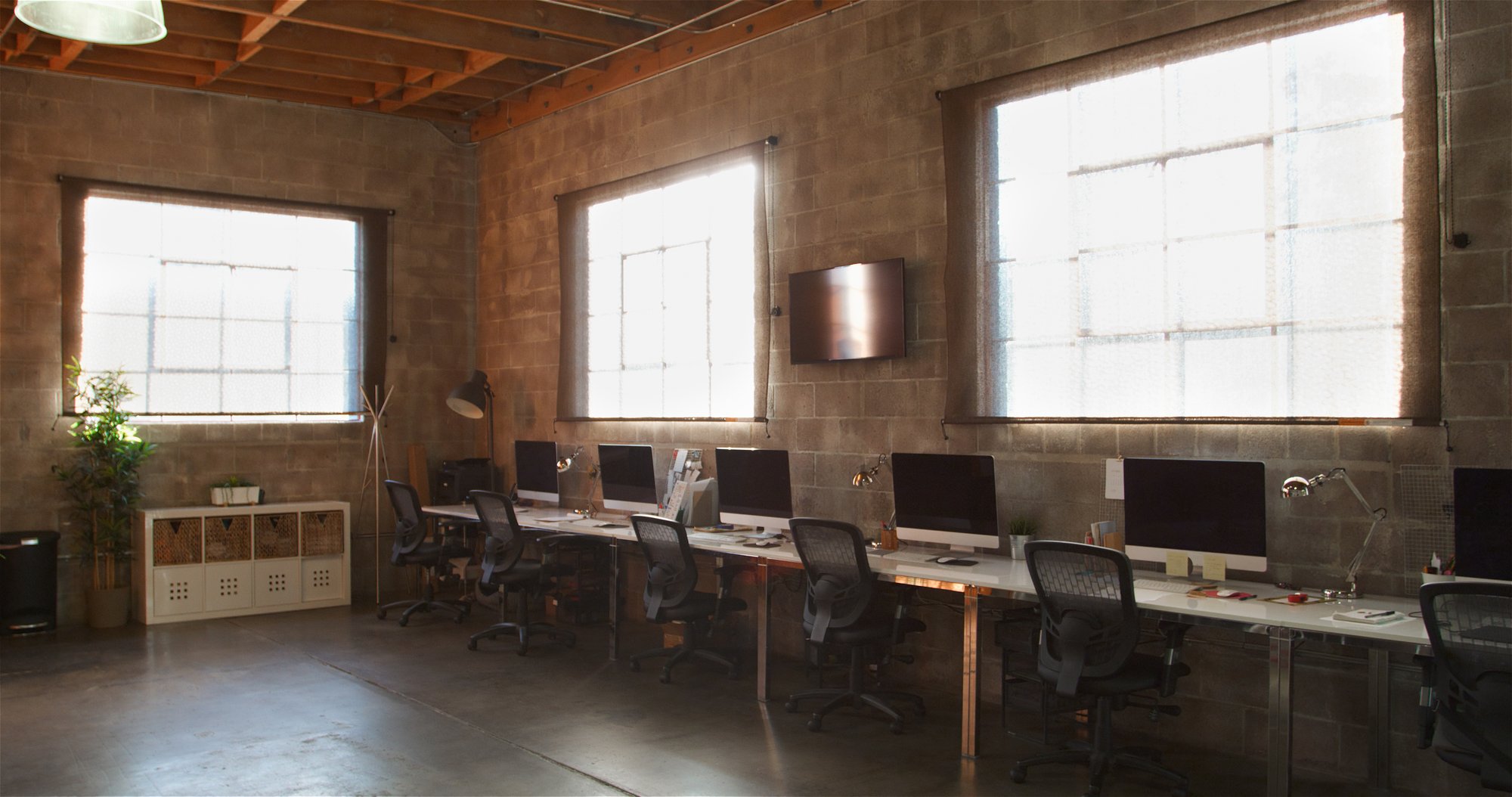 empty-interior-of-modern-open-plan-design-office-w-2024-12-28-17-46-46-utc