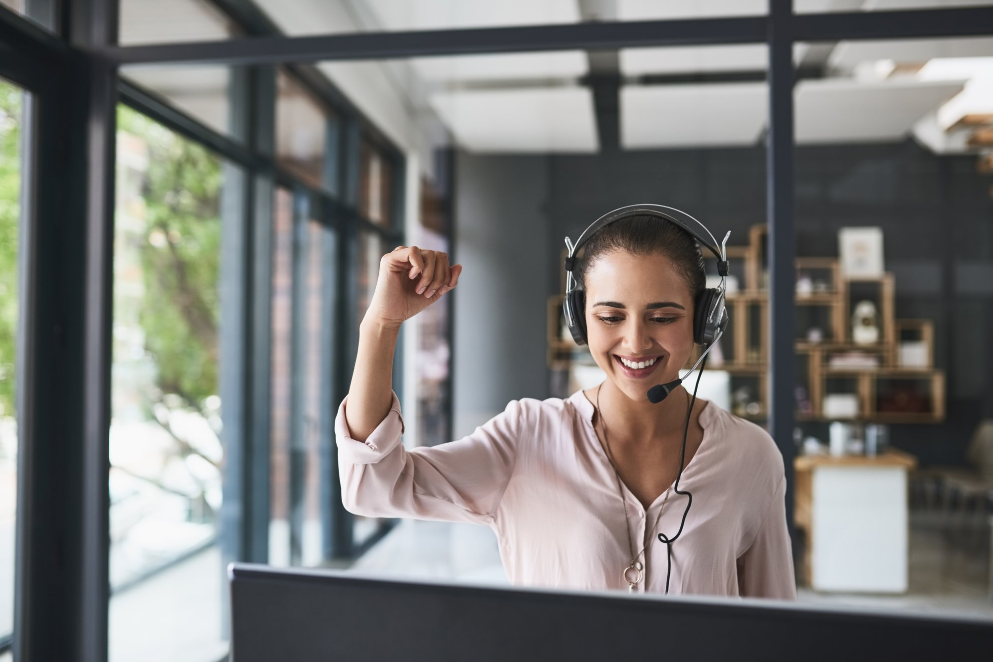 shot-of-a-cheerful-businesswoman-talking-to-a-cust-2026-03-09-01-55-12-utc